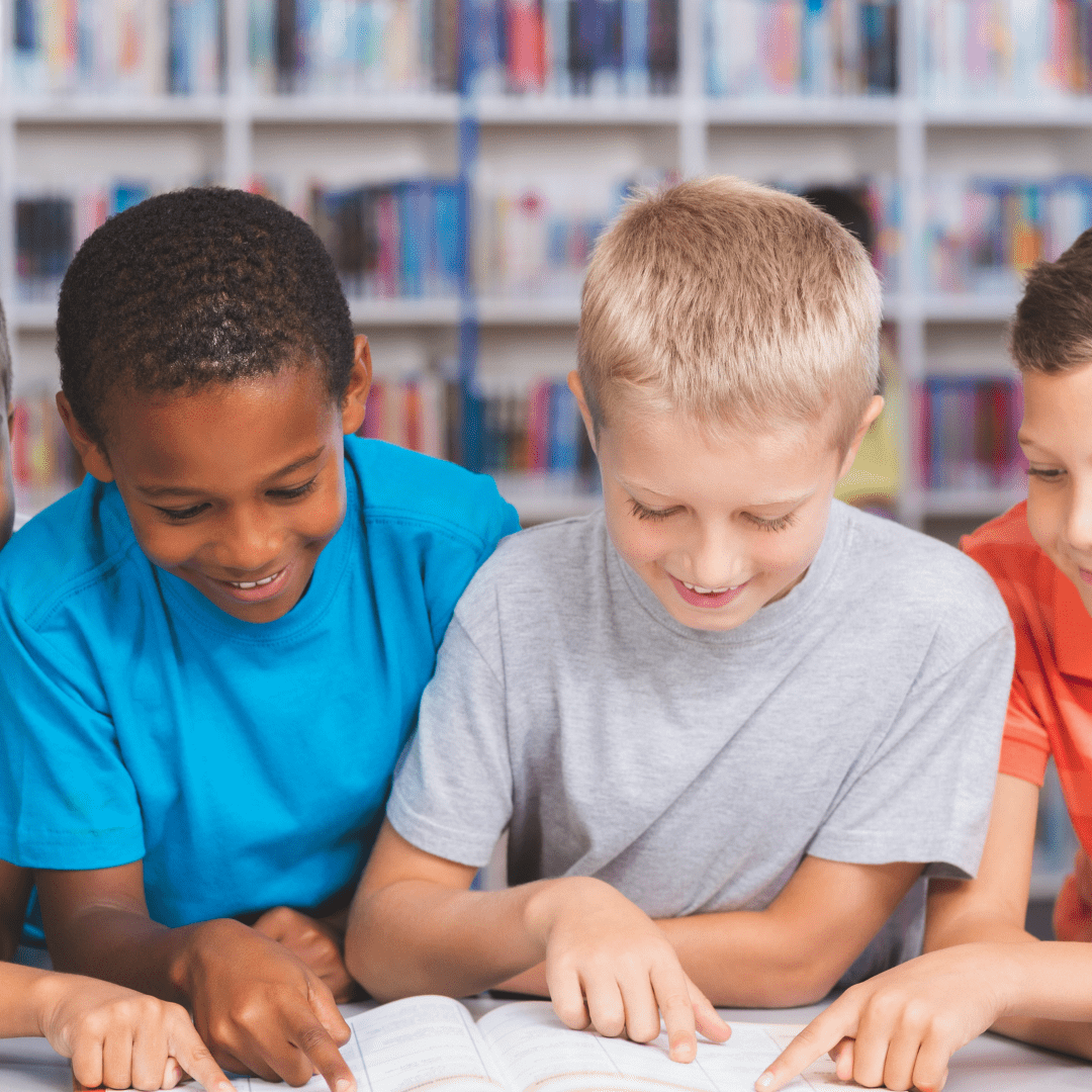 Kids enjoying a storybook in school library